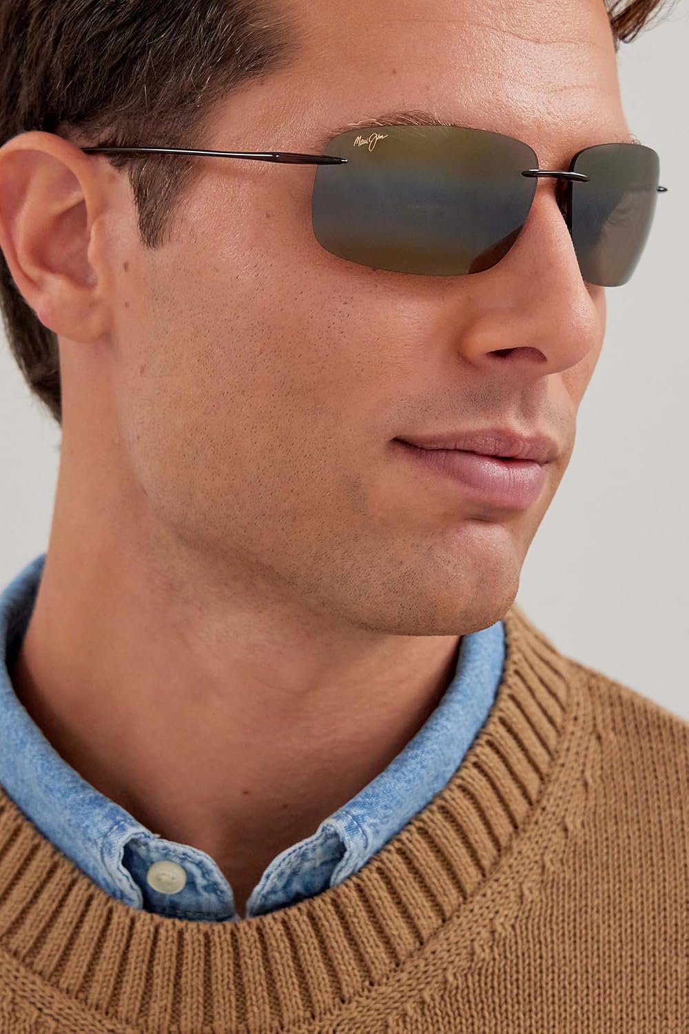 Polarized rimless sunglasses with gray lenses and titanium frame, front view — view 3