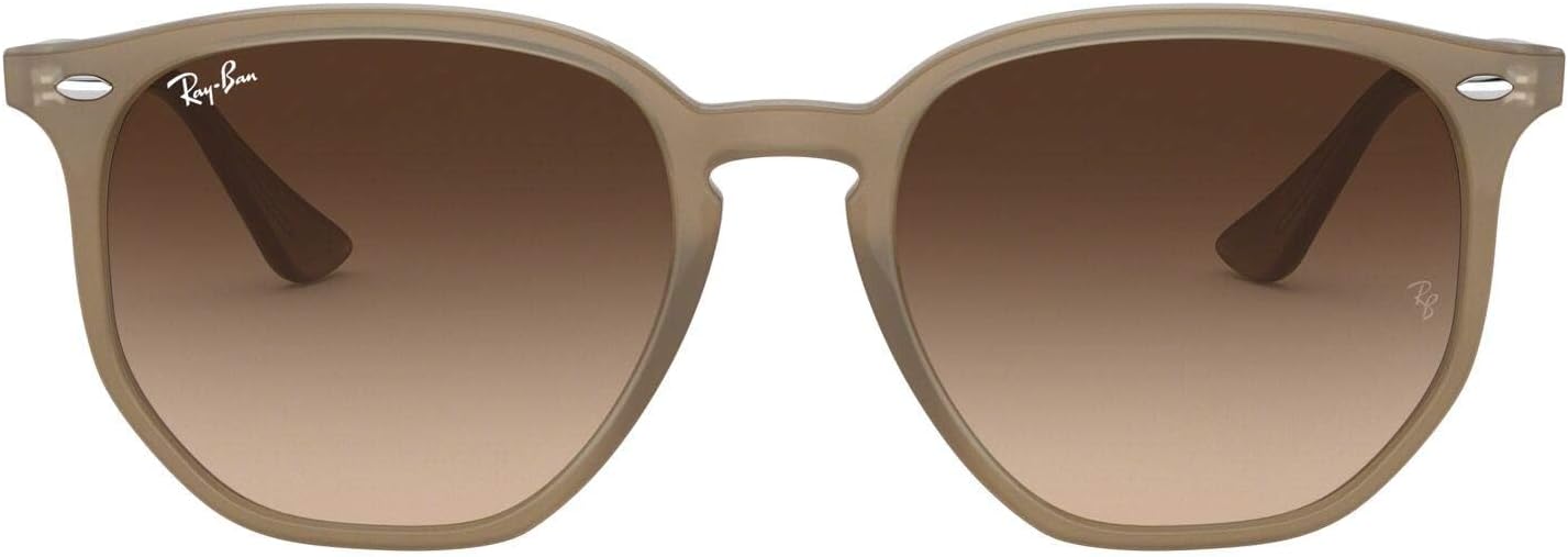 Geometric hexagonal sunglasses with gray lenses and metal frame in retro style — view 1