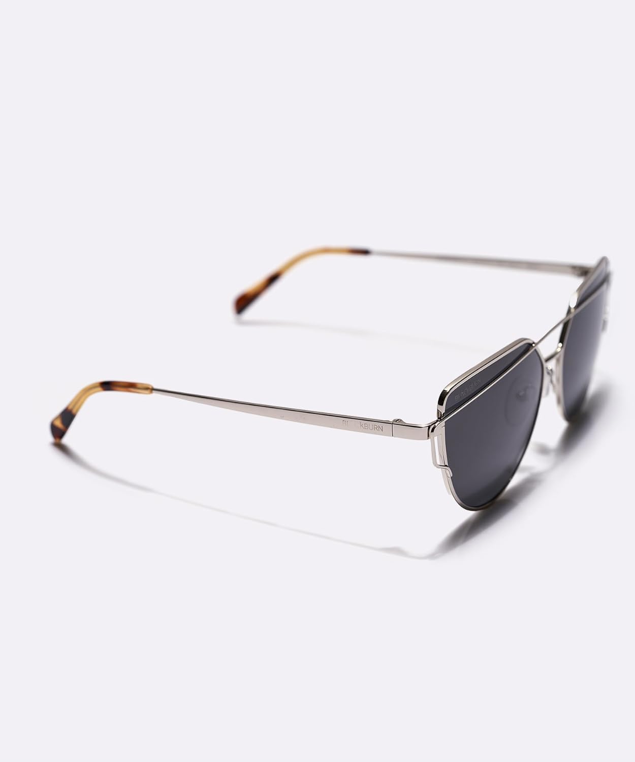 Oversized cat-eye sunglasses with gray lenses and acetate frame, front view — back
