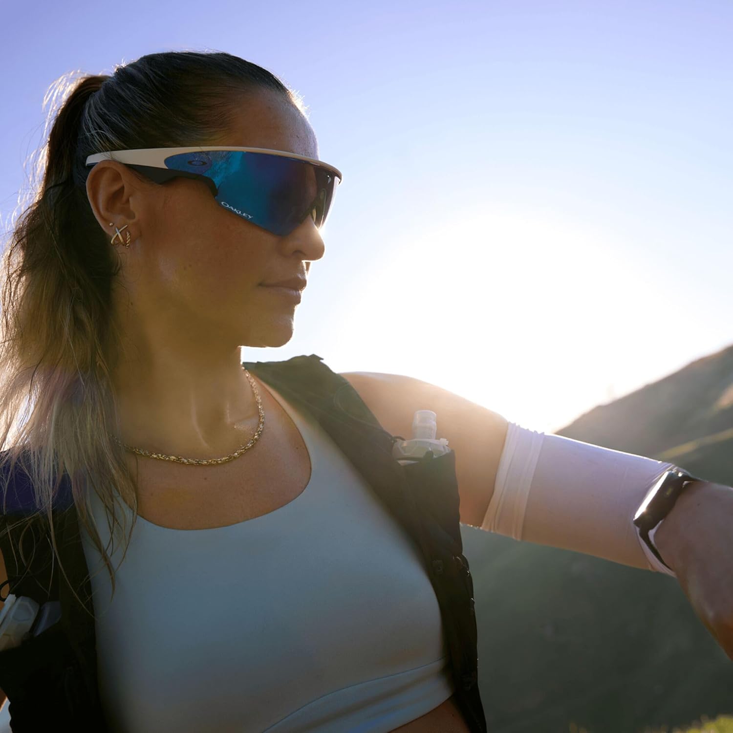 White mirrored rectangle sport sunglasses with blue-tinted polycarbonate lenses, designed for cycling and active outdoor activities — view 1